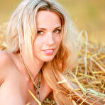 Third pic of Natalia B - Natalia B strips her little denim shorts in the hay and shows her amazing hot body.