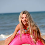 Second pic of Natalia B - Natalia B takes her sexy pink bikini off outdoors on the beach and shows off.