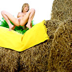 Third pic of Olga Barz - Beautiful blonde babe Olga Barz strips in the hay and shows us her round big jugs.