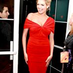 Fourth pic of Kate Upton posing in red dress at Sports Illustrated Swimsuit Issue Party