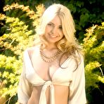 First pic of Sandy Summers - Blonde angel, Sandy Summers sits in the shade and slowly takes off her clothes.