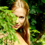 Second pic of Sonya C - Sonya C takes her clothes off outdoors in the garden and teases us in stockings.