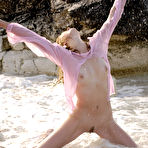 Third pic of Vika R - Vika R takes her clothes off outdoors on the rocks and shows her big boobs.