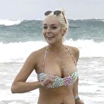 Fourth pic of Lindsay Lohan cleavage and areola slip in bikini