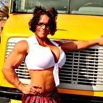 Second pic of Impressive huge female bodybuilder flexing her truly huge muscles