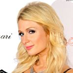 Second pic of Paris Hilton posing at OAK Las Vegas grand opening with Nicky