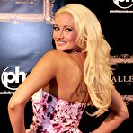 Second pic of Busty Holly Madison shows cleavage at Planet Hollywood resort casino in Las Vegas