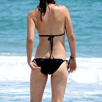 Third pic of Olivia Wilde in black bikini on the beach