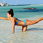 Second pic of Brooke Burke doing yoga in blue bikini