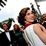 First pic of Milla Jovovich posing for paparazzi at Cannes Film Festival 2011