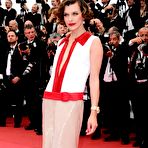 Fourth pic of Milla Jovovich posing for paparazzi at Cannes Film Festival 2011