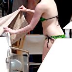 Third pic of Avril Lavigne in green bikini on the yeach paparazzi shots