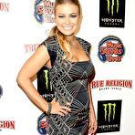 Second pic of Carmen Electra posing at redcarpet shows her legs