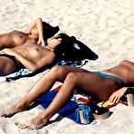 Second pic of Topless beach chicks