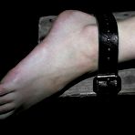 First pic of Bound bondage girl Kristine Kink gets her feet and asshole ruthlessly tortured.