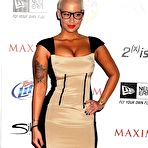 Third pic of Amber Rose shows cleavage and legs at Maxim Hot 100 Party 2011