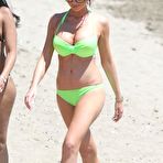 Third pic of Busty Amy Childs deep cleabage in green bikini