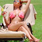 First pic of Amy Childs deep cleavage on the beach in Dubai