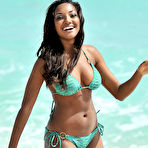 Third pic of Anastagia Pierre cleavage in green bikini on the beach in Miami