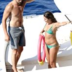 Fourth pic of Lea Michele nipple slip in green bikini on a boat in Italy
