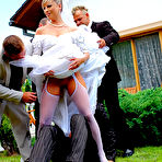 Second pic of Slutty bride Miss Piss gets gang banged, cum covered and pissed on outdoors
