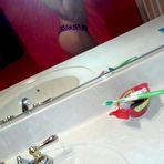 First pic of Amateur brunette hottie showing off her smoothly shaven snatch