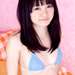 Second pic of Ai Eikura Asian takes fluffy skirt off and shows naughty behind