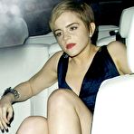 First pic of Emma Watson titslip and upskirt paparazzi shots at Finch & Partners pre-BAFTA party