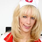 First pic of Блондинка в униформе медсестры растопырила вагину и воткнула туда самотык