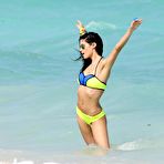 Third pic of Sara Sampaio in yellow bikini on a beach