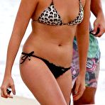 Second pic of Margot Robbie wearing a bikini on a beach