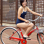 Second pic of Ageha Yagyu Asian in spandex bath suit shows curves on bike