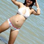 First pic of Cute little Thai amateur Febe poses at the beach and flashes