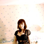 Third pic of Busty and sweet Japanese av idol Meguru Kosaka shows her sexy busty tits