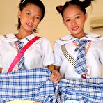 Third pic of Two cute young Filipina schoolgirls strip naked to show pussy