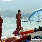 Second pic of Big boob and slim teen nudists lay out in the sun