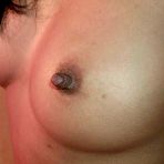 Second pic of Smoking asian girlfriend next door with bullet nipples