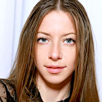 First pic of Blue-eyed darling Mika A with long brown hair, long and slender physique, and perky assets