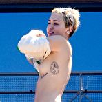 First pic of Miley Cyrus caught topless in Sydney