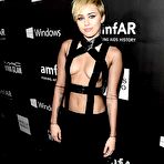 Second pic of Miley Cyrus flashing her skin again at amfAR