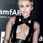 Third pic of Miley Cyrus flashing her skin again at amfAR