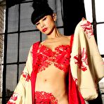 Second pic of Bai Ling almost nude Xmas photoshoot