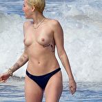 Second pic of Miley Cyrus caught topless on a beach