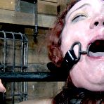 Second pic of SexPreviews - Maggie Mead redhead is bound in chains her tits milked by machine