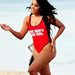 Third pic of Angela Simmons wearing a red swimsuit at Miami Beach
