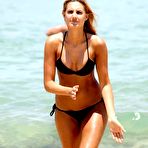 Third pic of Laura Dundovic in black bikini on Bondi Beach