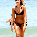 Fourth pic of Laura Dundovic in black bikini on Bondi Beach