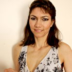 First pic of Hot MILF playing with her wet pussy on the couch