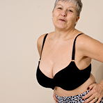 Third pic of Naughty British mature lady getting dirty