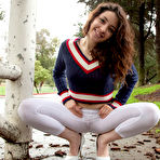 Fourth pic of Curly hair teen cutie plays outdoors in a sweater and sheer tights